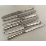 A good set of six Victorian silver handled knives.