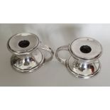 EDINBURGH: A pair of Scottish silver candlesticks