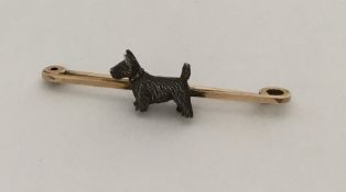 A silver mounted brooch in the form of a Scottie d