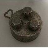 A rare finely engraved silver triple burner with e