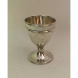 A Georgian silver egg cup. London 1790. By Henry C