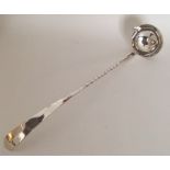 A large silver plated toddy ladle with twisted han