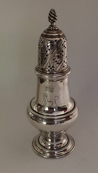 A heavy Georgian silver baluster shaped caster of