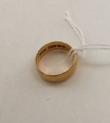 A plain 22 carat gold wedding band. Approx. 5.1 gr