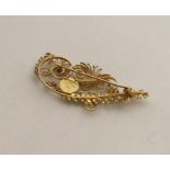 GEORG JENSEN: A rare 18 carat gold brooch in the f