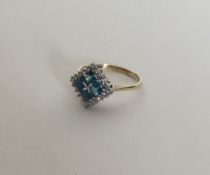 A topaz and diamond Art Deco style cluster ring. A