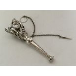 A Victorian silver posy holder with scroll decorat