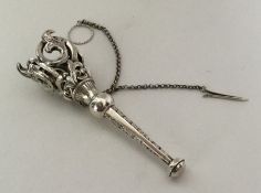 A Victorian silver posy holder with scroll decorat