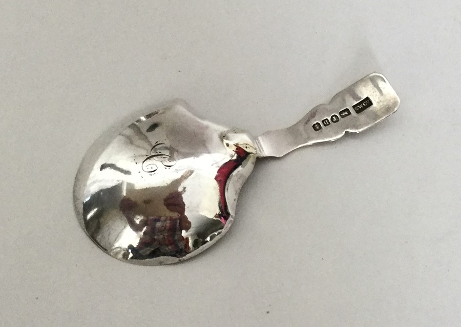 An Antique silver caddy spoon engraved with scroll - Image 2 of 2