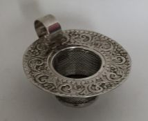 An unusual heavy silver tea strainer. Birmingham 1