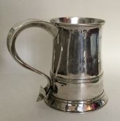 A massive silver tapering mug on pedestal base. Lo