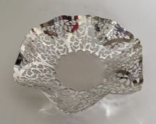 An attractive pierced silver sweet dish with heart