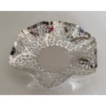 An attractive pierced silver sweet dish with heart