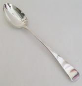 A large OE pattern silver basting spoon. London 18