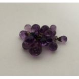 A group of faceted amethyst beads. Approx. 37 gram