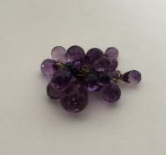 A group of faceted amethyst beads. Approx. 37 gram