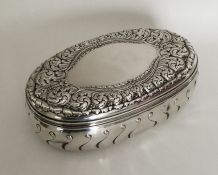 TIFFANY & CO: A large oval silver box attractively