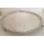 A George III silver salver attractively decorated