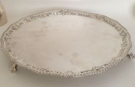 A George III silver salver attractively decorated