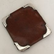 An unusual silver and leather purse with fitted in