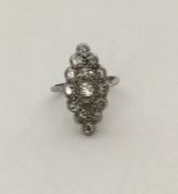 A large diamond marquise shaped cluster ring in pl