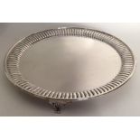 A Victorian silver circular salver with fluted bor