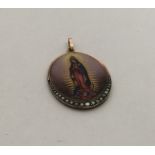 A heavy French oval, enamel and pearl pendant with