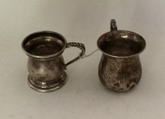 Two Edwardian silver spirits tots, one engraved wi