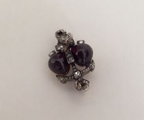 A rare Antique diamond and ruby brooch mounted wit