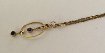 A small gold amethyst pendant. Approx. 4 grams. Es