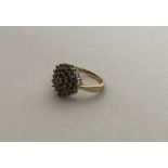 A heavy gold cluster ring. Approx. 4 grams. Est. £