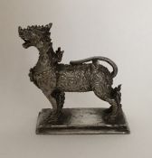 An unusual Chinese model of an animal on pedestal