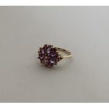A 9 carat amethyst ring in gold setting. Approx. 3