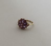 A 9 carat amethyst ring in gold setting. Approx. 3