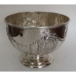 A heavy Edwardian silver rose bowl profusely decor