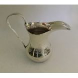 An Iraqi silver cream ewer decorated with sailing