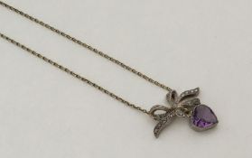An Antique amethyst and rose diamond pendant on fi