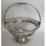 A good George III pierced silver basket with rope