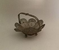 An attractive miniature silver filigree basket wit