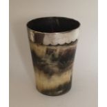 A tapering silver mounted horn beaker with glass b