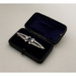 An attractive Edwardian sapphire and diamond boat