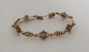 A stylish 9 carat amethyst bracelet with box clasp