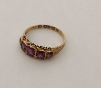 An Antique garnet five stone ring of tapering form