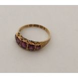 An Antique garnet five stone ring of tapering form