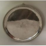 A good quality circular silver salver with gadroon