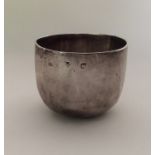 An 18th Century silver tumbler cup of plain form.