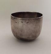 An 18th Century silver tumbler cup of plain form.