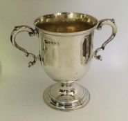 A good George III two handled loving cup of plain