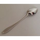 CORK: A Georgian silver teaspoon. Approx. 12 grams