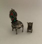 A silver miniature plique-à-jour chair together wi